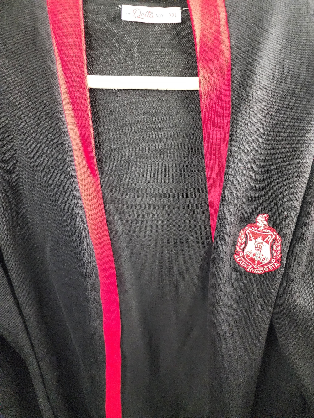 Delta Black Cardigan with Red Trim and Crest